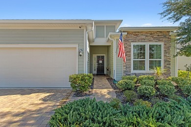 Experience The Perfect Blend Of Modern Luxury And Coastal on Golf Club At North Hampton in Florida - for sale on GolfHomes.com, golf home, golf lot