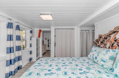 Welcome to this charming 3 BR, 3 Bath coastal retreat located in on Beachwood Golf Club in South Carolina - for sale on GolfHomes.com, golf home, golf lot