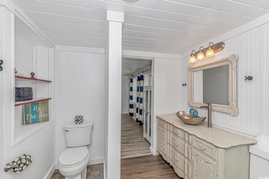 Welcome to this charming 3 BR, 3 Bath coastal retreat located in on Beachwood Golf Club in South Carolina - for sale on GolfHomes.com, golf home, golf lot