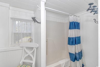 Welcome to this charming 3 BR, 3 Bath coastal retreat located in on Beachwood Golf Club in South Carolina - for sale on GolfHomes.com, golf home, golf lot