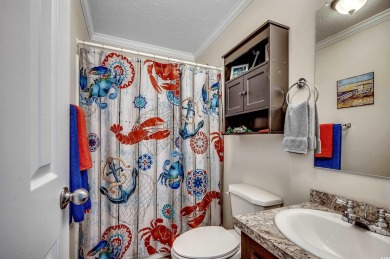 Looking for an affordable beach retreat that's move-in ready in on Barefoot Resort and Golf Club  in South Carolina - for sale on GolfHomes.com, golf home, golf lot