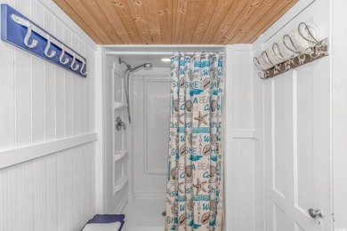 Welcome to this charming 3 BR, 3 Bath coastal retreat located in on Beachwood Golf Club in South Carolina - for sale on GolfHomes.com, golf home, golf lot