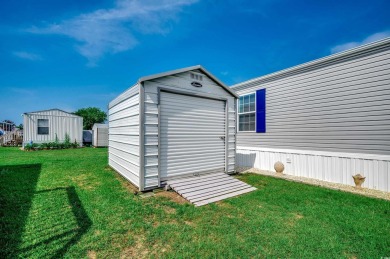 Looking for an affordable beach retreat that's move-in ready in on Barefoot Resort and Golf Club  in South Carolina - for sale on GolfHomes.com, golf home, golf lot