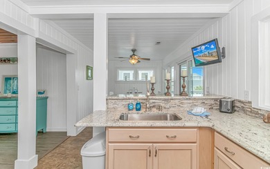 Welcome to this charming 3 BR, 3 Bath coastal retreat located in on Beachwood Golf Club in South Carolina - for sale on GolfHomes.com, golf home, golf lot