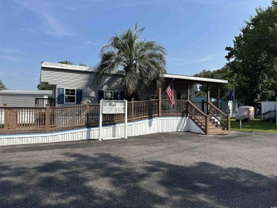 Looking for an affordable beach retreat that's move-in ready in on Barefoot Resort and Golf Club  in South Carolina - for sale on GolfHomes.com, golf home, golf lot