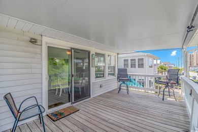 Welcome to this charming 3 BR, 3 Bath coastal retreat located in on Beachwood Golf Club in South Carolina - for sale on GolfHomes.com, golf home, golf lot