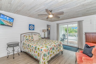 Welcome to this charming 3 BR, 3 Bath coastal retreat located in on Beachwood Golf Club in South Carolina - for sale on GolfHomes.com, golf home, golf lot