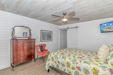 Welcome to this charming 3 BR, 3 Bath coastal retreat located in on Beachwood Golf Club in South Carolina - for sale on GolfHomes.com, golf home, golf lot