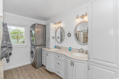 Welcome to this charming 3 BR, 3 Bath coastal retreat located in on Beachwood Golf Club in South Carolina - for sale on GolfHomes.com, golf home, golf lot