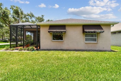 Beautifully maintained and updated home on a corner lot in a on Links At Greenfield Plantation in Florida - for sale on GolfHomes.com, golf home, golf lot
