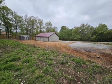 This newly finished house located right on the golf course, is on The Course At Turkey Mountain in Arkansas - for sale on GolfHomes.com, golf home, golf lot