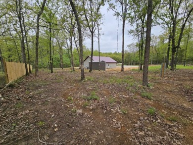 This newly finished house located right on the golf course, is on The Course At Turkey Mountain in Arkansas - for sale on GolfHomes.com, golf home, golf lot