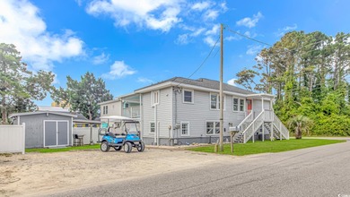 Welcome to this charming 3 BR, 3 Bath coastal retreat located in on Beachwood Golf Club in South Carolina - for sale on GolfHomes.com, golf home, golf lot