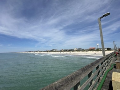 Looking for an affordable beach retreat that's move-in ready in on Barefoot Resort and Golf Club  in South Carolina - for sale on GolfHomes.com, golf home, golf lot