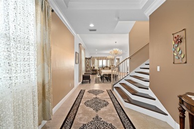 Modern Multigenerational Pool Home in Eagle Creek - 8148 on Eagle Creek Golf Club in Florida - for sale on GolfHomes.com, golf home, golf lot