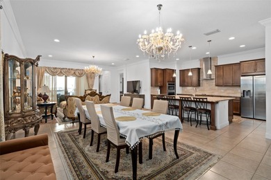 Modern Multigenerational Pool Home in Eagle Creek - 8148 on Eagle Creek Golf Club in Florida - for sale on GolfHomes.com, golf home, golf lot