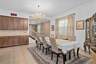 Modern Multigenerational Pool Home in Eagle Creek - 8148 on Eagle Creek Golf Club in Florida - for sale on GolfHomes.com, golf home, golf lot