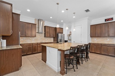 Modern Multigenerational Pool Home in Eagle Creek - 8148 on Eagle Creek Golf Club in Florida - for sale on GolfHomes.com, golf home, golf lot