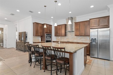 Modern Multigenerational Pool Home in Eagle Creek - 8148 on Eagle Creek Golf Club in Florida - for sale on GolfHomes.com, golf home, golf lot