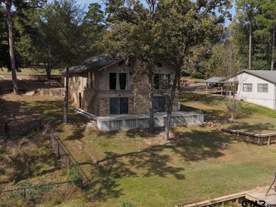 Discover a great WATERFRONT opportunity in the gated community on Hide-A-Way Lake Golf Course in Texas - for sale on GolfHomes.com, golf home, golf lot