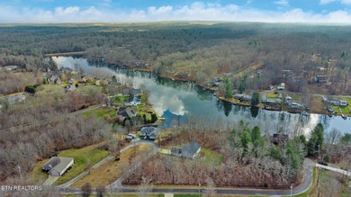 Beautiful over 1/2 Acre Lakefront Lot! Level to Gently sloping on Lake Tansi Village Country Club in Tennessee - for sale on GolfHomes.com, golf home, golf lot