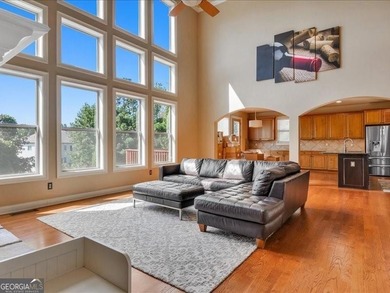 Experience luxury living in this expansive 5,300+ sq ft, 6BR/5BA on Mirror Lake Golf Club in Georgia - for sale on GolfHomes.com, golf home, golf lot