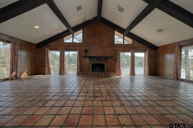 Discover a great WATERFRONT opportunity in the gated community on Hide-A-Way Lake Golf Course in Texas - for sale on GolfHomes.com, golf home, golf lot