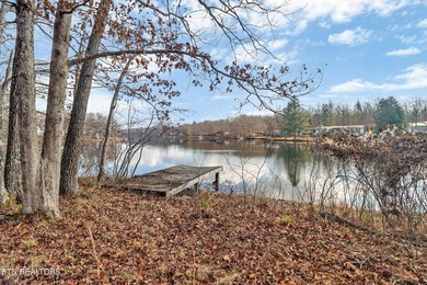 Beautiful over 1/2 Acre Lakefront Lot! Level to Gently sloping on Lake Tansi Village Country Club in Tennessee - for sale on GolfHomes.com, golf home, golf lot