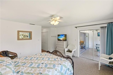 Experience the tranquility of the western skyline from this on Imperial Golf Club in Florida - for sale on GolfHomes.com, golf home, golf lot