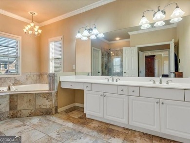 Experience luxury living in this expansive 5,300+ sq ft, 6BR/5BA on Mirror Lake Golf Club in Georgia - for sale on GolfHomes.com, golf home, golf lot