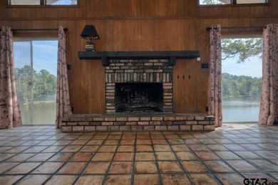 Discover a great WATERFRONT opportunity in the gated community on Hide-A-Way Lake Golf Course in Texas - for sale on GolfHomes.com, golf home, golf lot