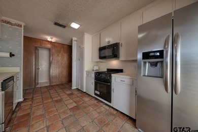 Discover a great WATERFRONT opportunity in the gated community on Hide-A-Way Lake Golf Course in Texas - for sale on GolfHomes.com, golf home, golf lot