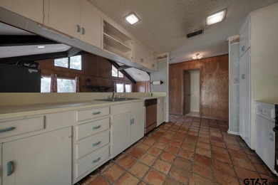 Discover a great WATERFRONT opportunity in the gated community on Hide-A-Way Lake Golf Course in Texas - for sale on GolfHomes.com, golf home, golf lot