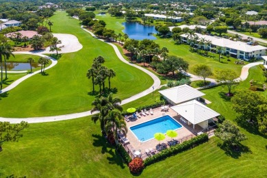 Immerse yourself in the beauty of the surrounding landscape on Quail Ridge Golf Course and Country Club in Florida - for sale on GolfHomes.com, golf home, golf lot