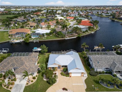 PUNTA GORDA ISLES! EXCEPTIONAL 3 BEDROOM, 2 BATH, 2-CAR GARAGE on Saint Andrews South Golf Club in Florida - for sale on GolfHomes.com, golf home, golf lot