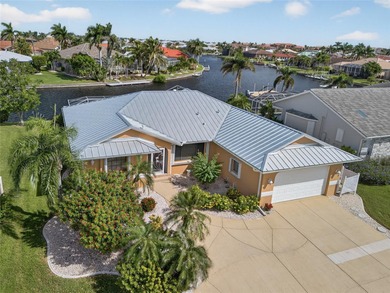 PUNTA GORDA ISLES! EXCEPTIONAL 3 BEDROOM, 2 BATH, 2-CAR GARAGE on Saint Andrews South Golf Club in Florida - for sale on GolfHomes.com, golf home, golf lot
