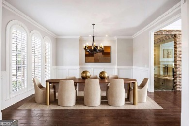 Experience the pinnacle of luxury living in this magnificent on Manor Golf and Country Club in Georgia - for sale on GolfHomes.com, golf home, golf lot