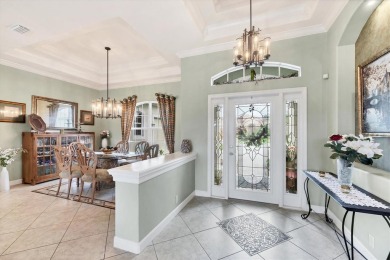 Former Model Home with Exceptional Upgrades and Panoramic Golf on Pelican Pointe Golf and Country Club in Florida - for sale on GolfHomes.com, golf home, golf lot