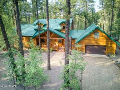 Charming Log-Sided Retreat in Prestigious White Mountain Summer on White Mountain Country Club in Arizona - for sale on GolfHomes.com, golf home, golf lot