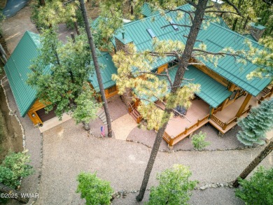 Charming Log-Sided Retreat in Prestigious White Mountain Summer on White Mountain Country Club in Arizona - for sale on GolfHomes.com, golf home, golf lot