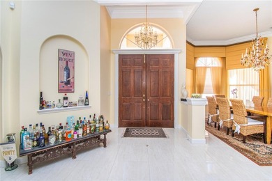 Experience refined luxury and timeless craftsmanship in this on University Park Country Club in Florida - for sale on GolfHomes.com, golf home, golf lot
