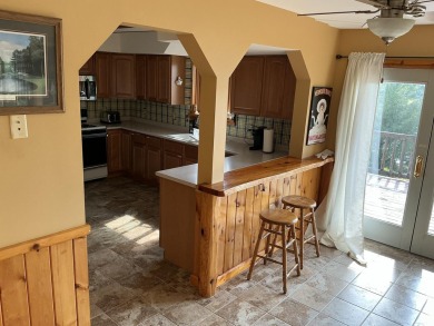Experience luxury and serenity with this beautifully appointed 3 on Eagle Ridge Golf Course in Michigan - for sale on GolfHomes.com, golf home, golf lot