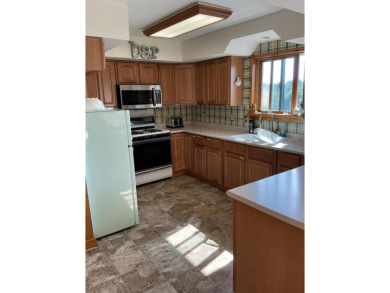 Experience luxury and serenity with this beautifully appointed 3 on Eagle Ridge Golf Course in Michigan - for sale on GolfHomes.com, golf home, golf lot