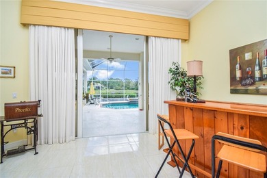 Experience refined luxury and timeless craftsmanship in this on University Park Country Club in Florida - for sale on GolfHomes.com, golf home, golf lot