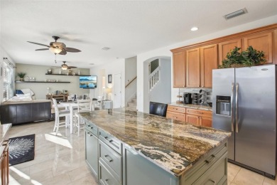 Discover this stunning, Golf Course View, 4-bedroom, 3 on Heritage Isles Golf and Country Club in Florida - for sale on GolfHomes.com, golf home, golf lot