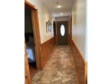 Experience luxury and serenity with this beautifully appointed 3 on Eagle Ridge Golf Course in Michigan - for sale on GolfHomes.com, golf home, golf lot