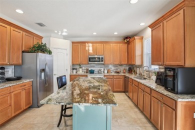 Discover this stunning, Golf Course View, 4-bedroom, 3 on Heritage Isles Golf and Country Club in Florida - for sale on GolfHomes.com, golf home, golf lot