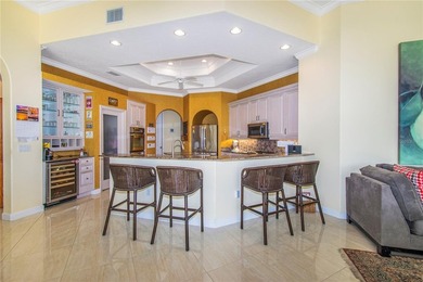 Experience refined luxury and timeless craftsmanship in this on University Park Country Club in Florida - for sale on GolfHomes.com, golf home, golf lot