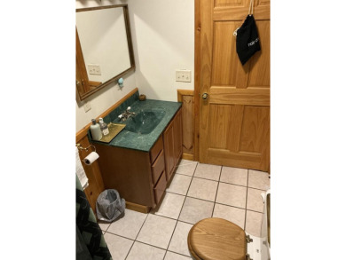 Experience luxury and serenity with this beautifully appointed 3 on Eagle Ridge Golf Course in Michigan - for sale on GolfHomes.com, golf home, golf lot
