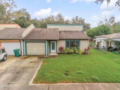 This move-in ready home provides a perfect blend of comfort and on Riviera Country Club in Florida - for sale on GolfHomes.com, golf home, golf lot